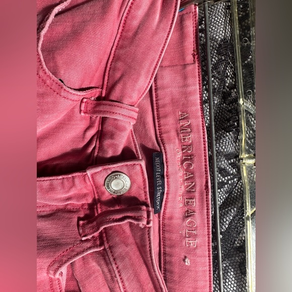 American Eagle next level pink ripped distressed jeggings. Size 2 - Picture 5 of 7